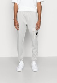 Nike Sportswear Tracksuit bottoms - grey