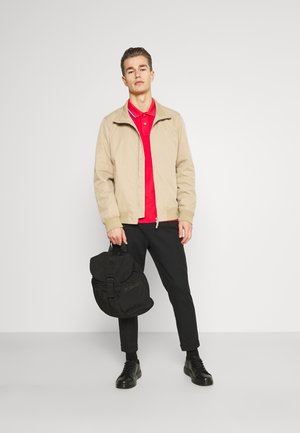 TIPPING RUGGER - Pikeepaita - bright red