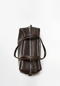 Dark brown leather toiletry bag with a silver zipper and two carrying handles on a white background.