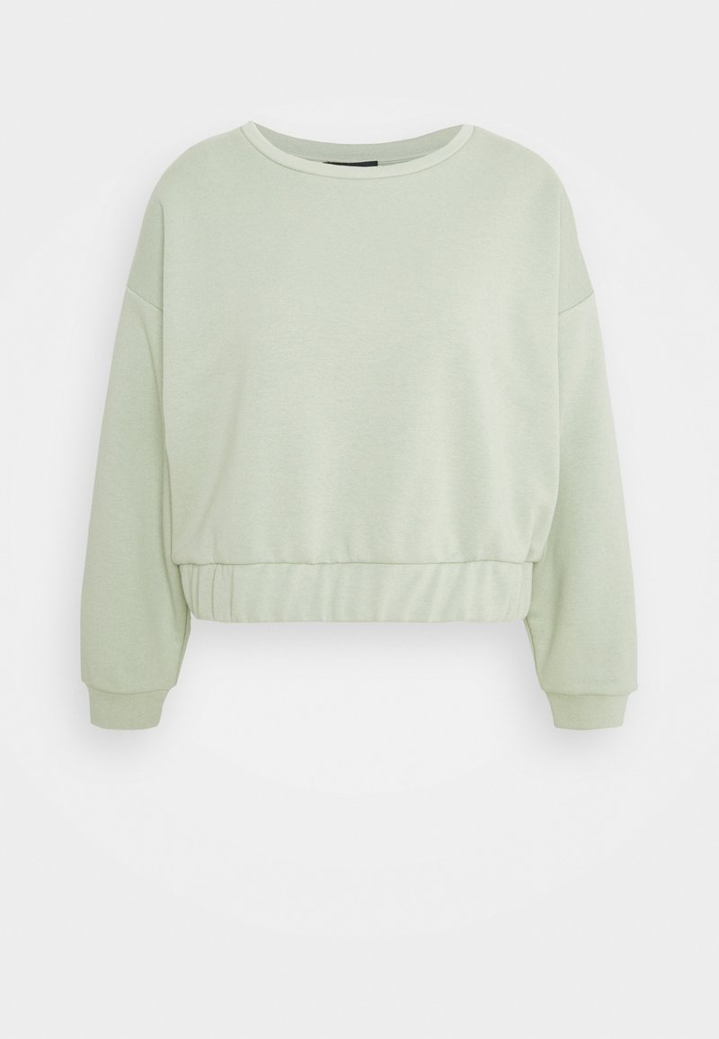 Sweat-shirt court vert clair à manches longues avec encolure ronde, taille élastique et poignets côtelés sur fond uni.