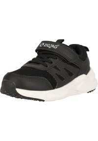 Scarpa sportiva nera con tomaia in pelle sintetica, dettagli in rete, suola in gomma bianca e cinturino regolabile in Velcro. Logo a zigzag in evidenza.