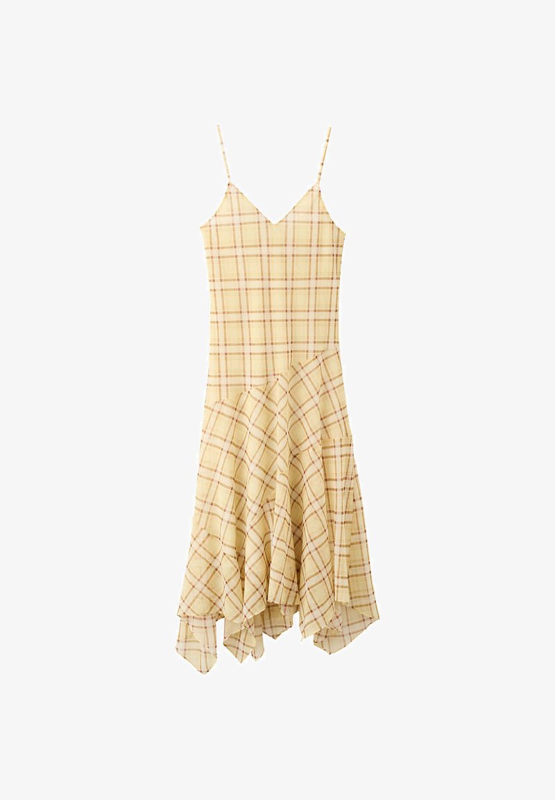Robe sans manches à carreaux jaunes avec fines bretelles et ourlet asymétrique à volants.