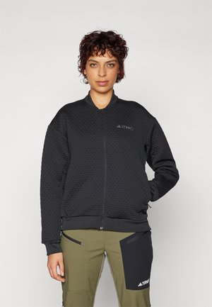 Tröja med dragkedja - black