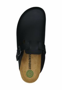 Black slip-on sandal with a flat sole, adjustable strap, cork footbed, and green logo detail on the insole. Smooth, matte finish.