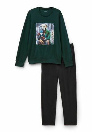 Green sweatshirt with a printed graphic of a dog in a suit holding a drink; paired with black pants, both made from a soft material.