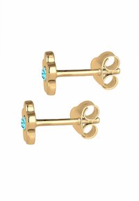 Guldtonede blomsterformede studs med turkise rhinsten i midten. Metalprojektionerne har sommerfuglebags på for sikker bæring.