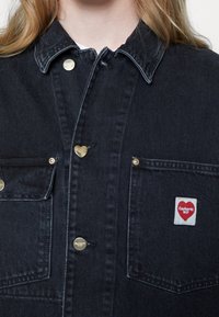 Carhartt WIP Giacca di jeans - black denim