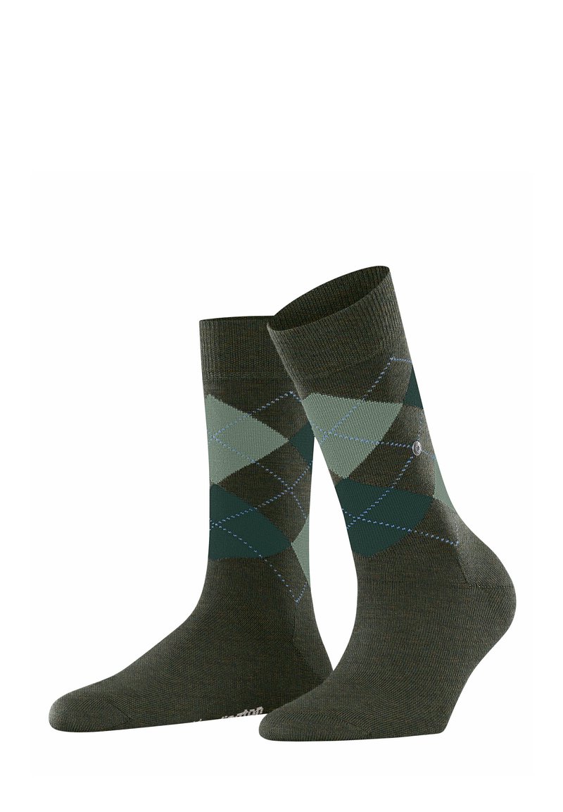 Chaussettes vertes avec un motif argyle dans des nuances de vert foncé et de vert clair. Fabriquées en tissu avec un revers côtelé et un orteil renforcé.