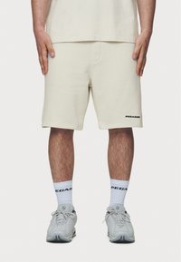 Pegador LOGO - Šorti - washed salty cream
