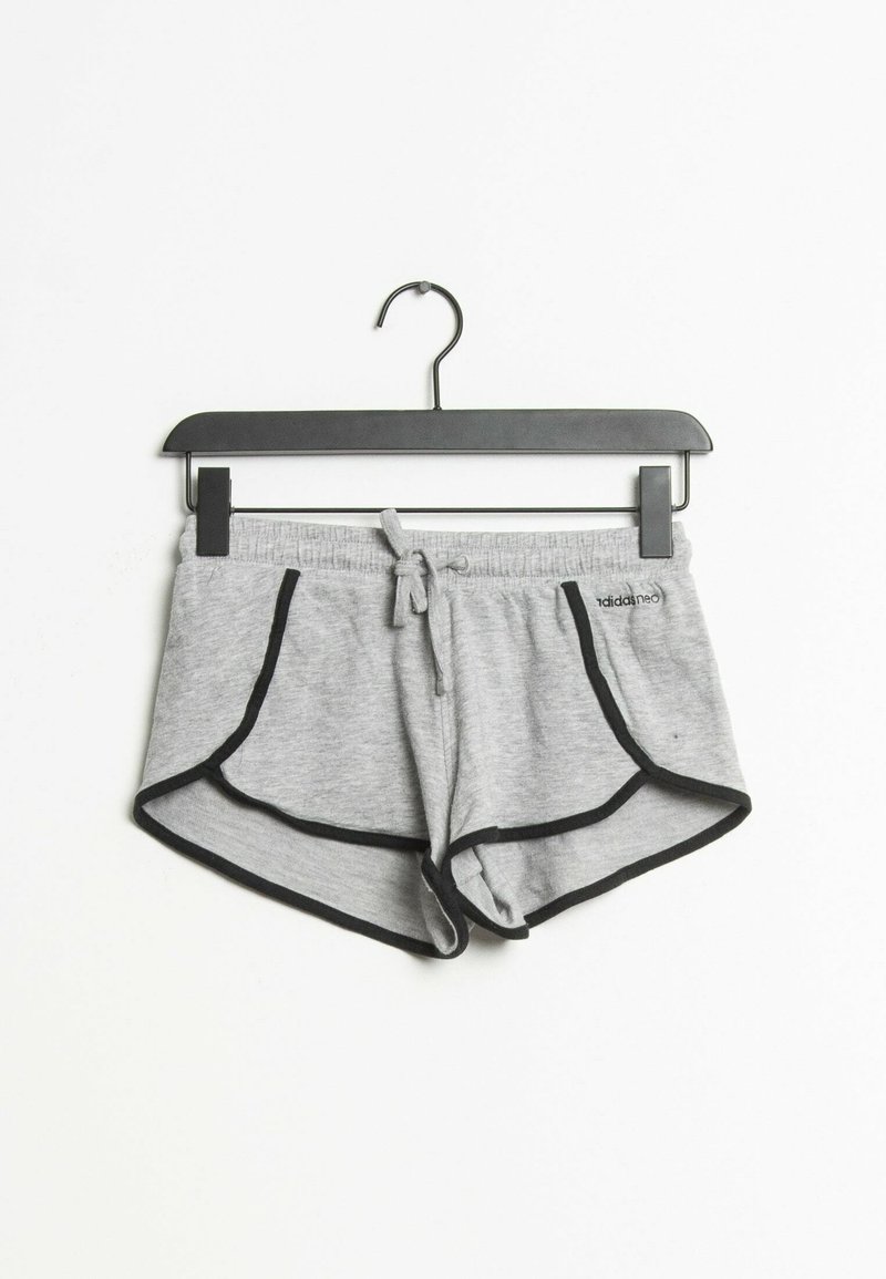 Grey athletic shorts made of soft fabric, featuring black trim, an elastic waistband with a drawstring, and side pockets.