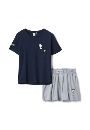 Navy blue short-sleeve top with Snoopy and Woodstock on pocket, paired with gray shorts featuring Snoopy wearing a nest with Woodstock.