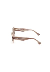 Gafas de plástico moradas claras con montura redondeada y brazos afilados. Incluye acentos dorados y una sutil textura veteada.