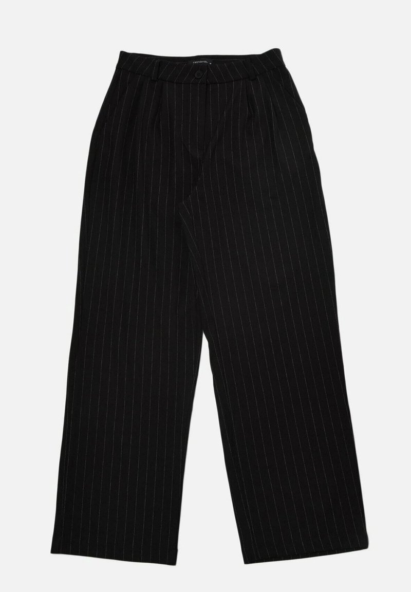 Pantalon noir taille haute à jambes larges avec fines rayures blanches, ceinture à boutons et plis devant, posé à plat sur fond blanc.