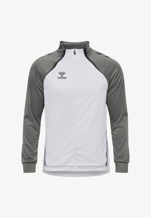 Weißes Zip-Up-Jackett mit grauen Ärmeln, ausgestattet mit einem hohen Kragen, schwarzen Akzenten und einem Logo auf der Brust. Hergestellt aus leichtem Stoff.