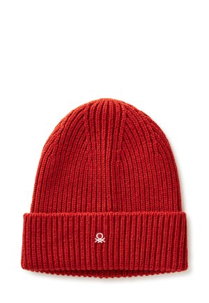 Red knitted beanie with a ribbed texture, featuring a folded brim and a small white logo on the front.