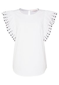 Camicia bianca con maniche arricciate a pois neri. Chiusura a occhio di chiave sul retro, texture liscia e vestibilità comoda.