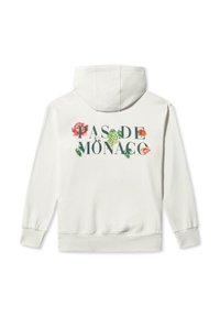 Biely mikina s kapucňou s nápisom "PAS DE MONACO" a kvetinovými akcentmi na chrbte. Mäkká tkanina s rebrovanými manžetami a spodným lemom.