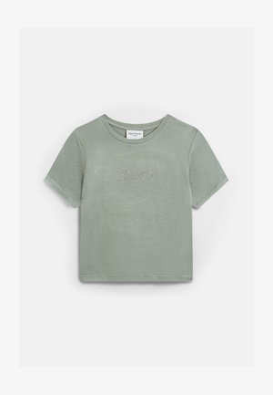 Camiseta de algodão verde claro com mangas curtas, com "Juicy" bordado em strass no peito. Gola redonda clássica.