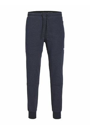 Joggers azul marino hechos de una tela suave con cintura elástica y cordón. Presentan piernas ajustadas y puños acanalados, con bolsillos laterales.