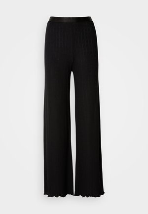 Black wide-leg trousers with a smooth waistband, featuring subtle vertical ribbing and scalloped hems for added texture and detail.