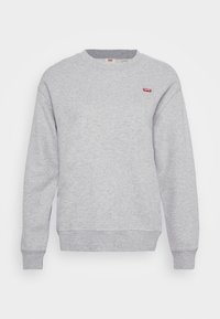 Sweat-shirt gris en tissu mélange de coton. Caractéristiques : col rond, poignets côtelés et petit logo rouge sur la poitrine. Design simple et décontracté.