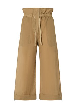Pantaloni beige a gamba larga con una cintura elastica alta, coulisse, tasche frontali e dettagli con zip alle caviglie. Tessuto testurizzato.