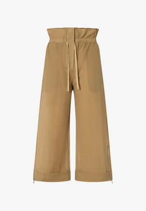 Pantalones de pierna ancha beige con una alta cintura elástica, cordón, bolsillos frontales y detalles con cremallera en los tobillos. Tejido texturizado.