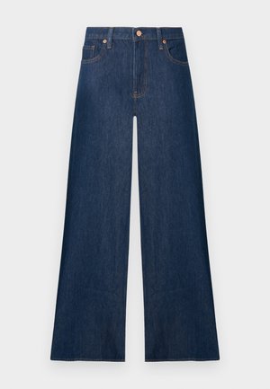 Mørkeblå vid bens denimjeans med frontknapp og lommer, vist mot en ensfarget lys bakgrunn.