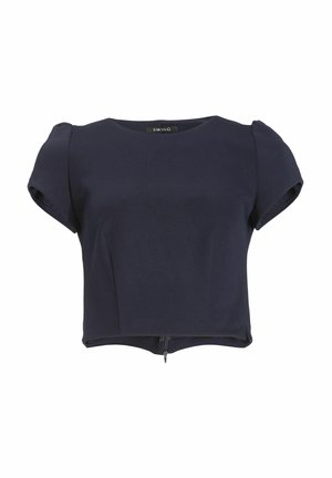 Blusa corta blu navy in tessuto liscio. Caratterizzata da maniche corte a sbuffo, scollo rotondo e chiusura con zip sul retro.