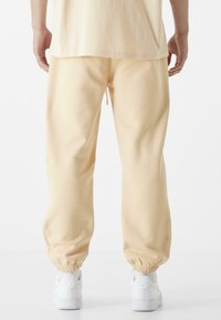 9N1M SENSE ESSENTIAL  - Jogginghose - vanille