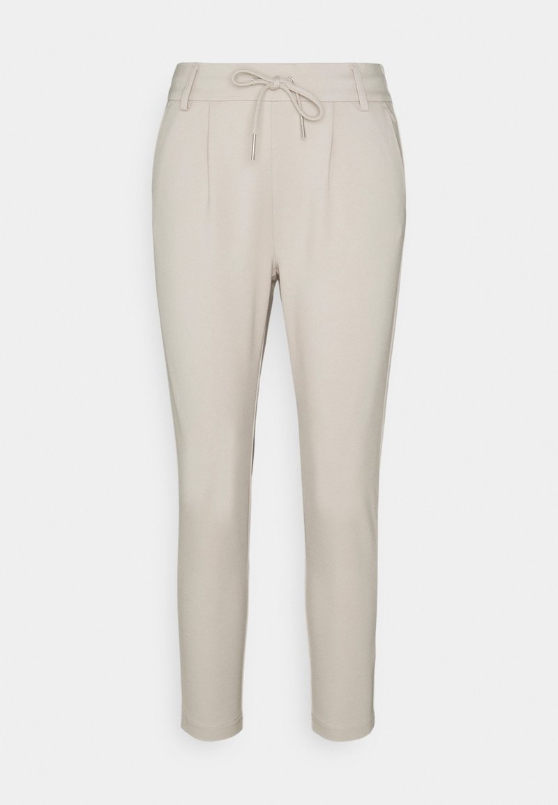 Pantalon slim beige clair avec plis devant, poches latérales, passants de ceinture et fermeture à cordon à la taille, présenté sur fond uni.