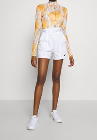 Nike Sportswear Träningsbyxor - white