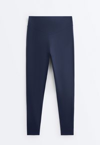 Navy blue high-waisted leggings with a V-shaped seam detail at the waistband, displayed flat on white background.