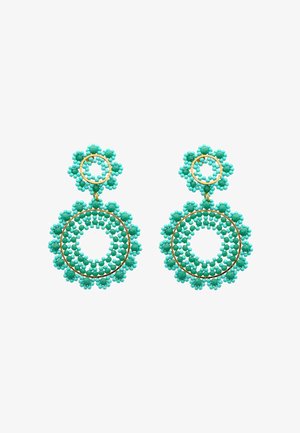 Turkoosit helmiripustimet, joissa on kukkakuvio, pyöreitä muotoja ja kullanvärisiä yksityiskohtia. Karkea pinta avoimine keskiosineen.