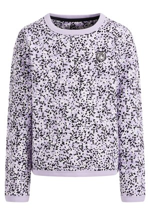 Chemise à manches longues mauve clair avec un motif abstrait de taches noires et blanches et un petit emblème de tête de tigre sur la poitrine gauche.