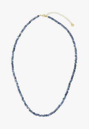 Necklace with small faceted blue beads and gold spacer rings, featuring a gold chain extender and round charm at the clasp.