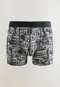 Boxers en noir et blanc avec des imprimés architecturaux détaillés des monuments romains et une ceinture noire avec "ROMA" en relief.