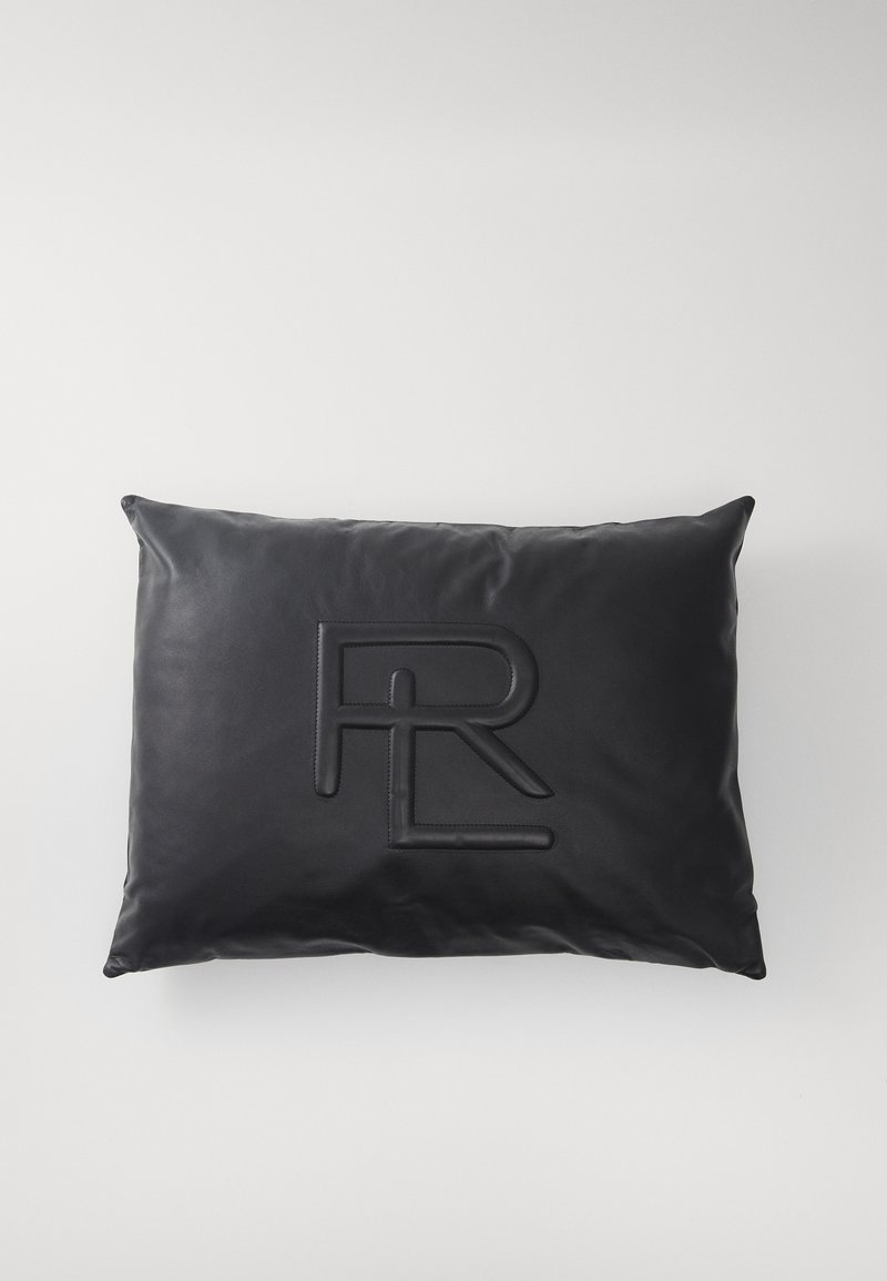 Black leather pillow with embossed "RL" logo. Smooth texture, rectangular shape, and subtle sheen enhance its sleek appearance.
