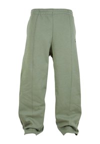 Pantalon de survêtement gris-vert avec taille élastique. Présentant des coutures latérales et des poches resserrées. Fabriqué en tissu doux et respirant.