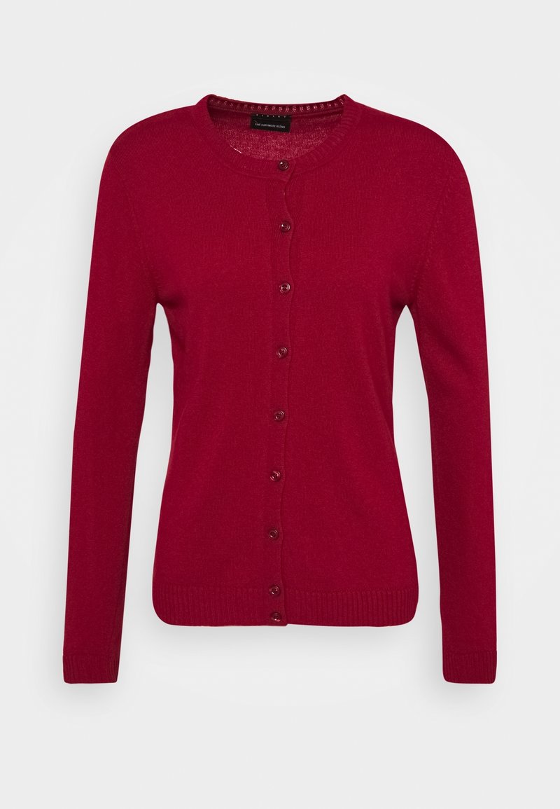 Röd kofta i mjukt stickat tyg, med rund halsringning, långa ärmar och knappstängning fram med matchande knappar.