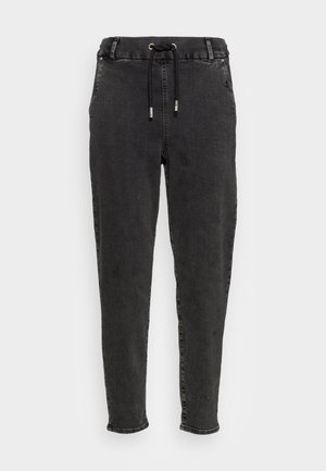 Svart denim joggerbyxor med elastisk midja, dragsko, avsmalnande ben och subtilt blekt mönster på tyget.