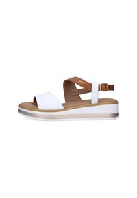 Sandali in pelle bianca con cinturino marrone, fibbia regolabile e suola piatta color beige con una fascia dorata decorativa. Sottopiede testurizzato per il comfort.