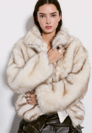 Zimná bunda - beige