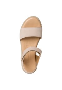 Beige sandal with two wide straps, soft leather upper, cushioned footbed, and a textured rubber sole for grip. Simple and modern design.