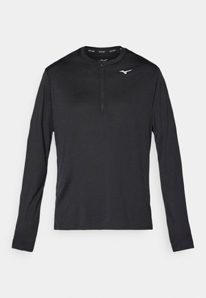 Long-sleeve athletic shirt in black, featuring a half-zip neckline and a small white logo on the chest. Made of smooth, lightweight fabric.