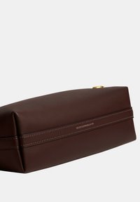 Dark brown rectangular leather clutch with stitched detailing and a small gold clasp on a plain white background.