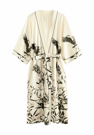 Accappatoio leggero in crema con stampe floreali e di uccelli nere, colletto a scialle, maniche ampie e cintura di chiusura, con un design a apertura frontale.