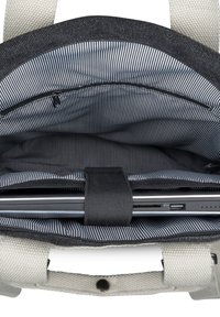 Torba na laptopa o szarym zewnętrzu i paskowanej czarno-białej podszewce. Posiada kieszeń z zamkiem błyskawicznym oraz pasek do zabezpieczenia laptopa wewnątrz.