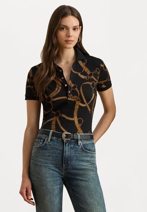 Black polo shirt featuring a brown chain pattern, short sleeves, and a buttoned collar. Worn with blue jeans and a black belt.