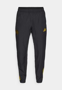 MANCHESTER UNITED 25/26 EUROPEAN PRESENTATION PANTS - Roupa de discoteca - black/blue/tribe yellow